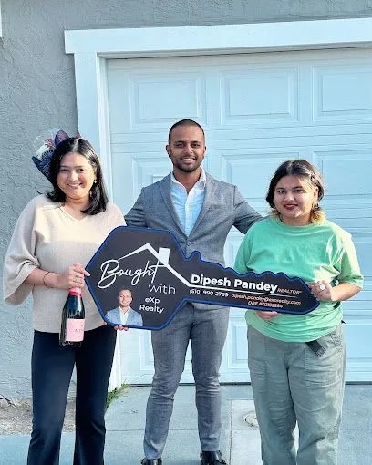 Buyers with their Bought with Dipesh Pandey key sign